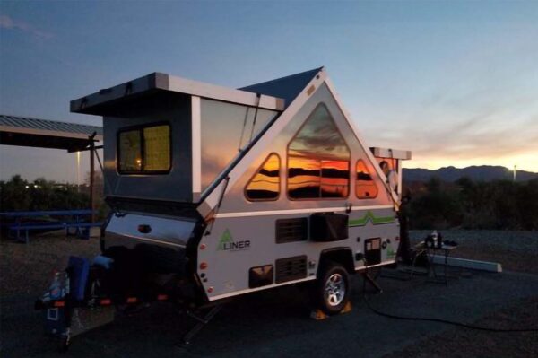 Aliner trailer at sunset