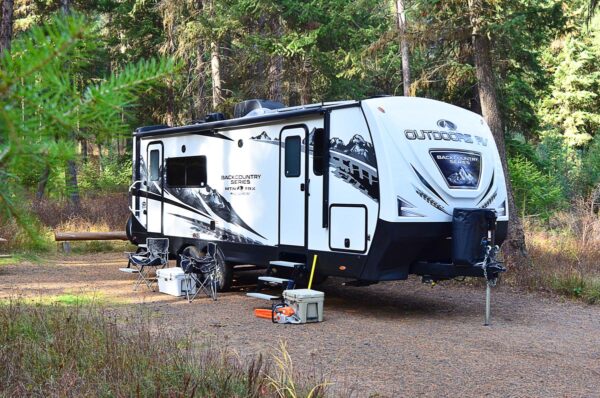 Outdoors RV Backcountry series set up for camp in woods